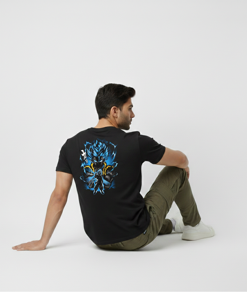 Person wearing a black t-shirt with a blue graphic on the back, sitting on a white background